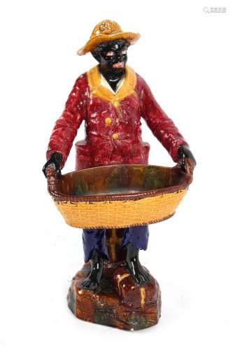 Property of a deceased estate - a late 19th / early 20th century Continental majolica figure of a