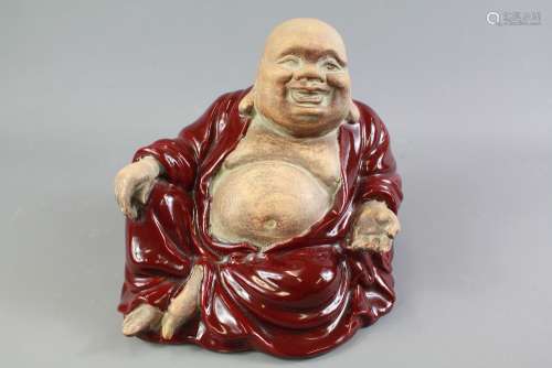 An Italian Majolica Terracotta Laughing Buddha