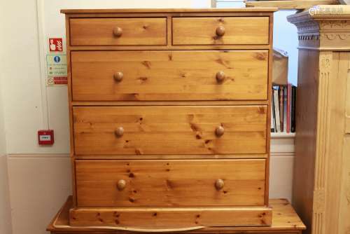 A Large Pine Chest Of Drawers