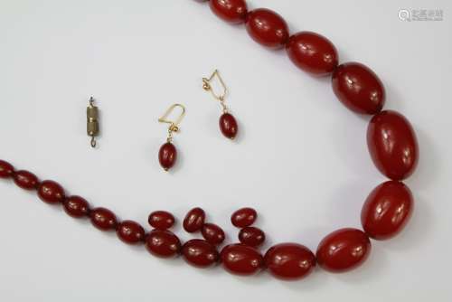 An Amber Necklace and Matching Drop Earrings