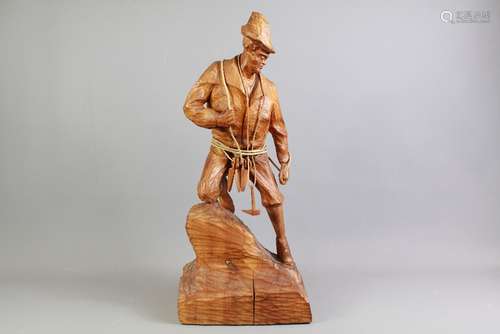 A Wood Carving of an Alpine Mountaineer