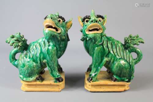 A Pair of Antique Emerald-Green Ceramic Kylins