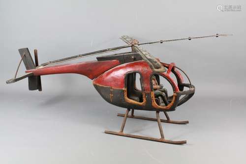 A Hand Made Wood Carved Helicopter