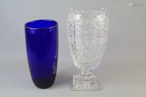 A 20th Century German Cut Glass Vase, approx 30 cms h x 14 cms diameter together with a Cobalt Blue Studio Vase approx 30 cms
