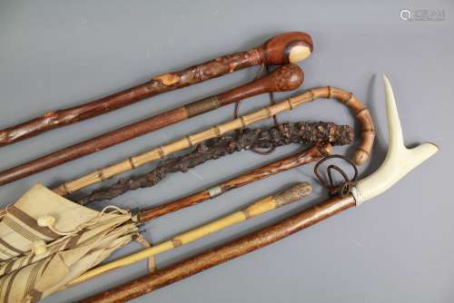 Fifteen Vintage Wood-Carved Walking Sticks