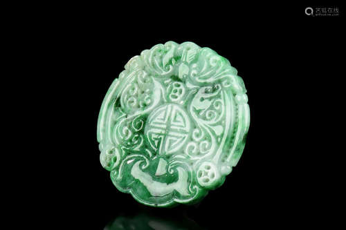 JADEITE CARVED 'AUSPICIOUS' ROUND ORNAMENT