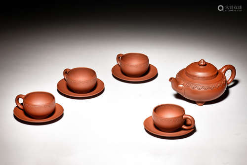 GU JINZHOU: SET OF YIXING ZISHA TEAPOT, TEA CUPS, AND SAUCERS