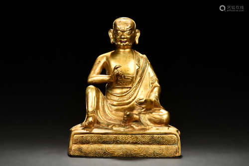 GILT BRONZE SEATED MAHASIDDHA FIGURE