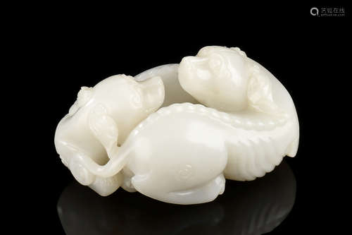 PAIR OF WHITE JADE CARVED 'DOGS' FIGURES