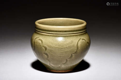 CELADON GLAZED AND CARVED JAR