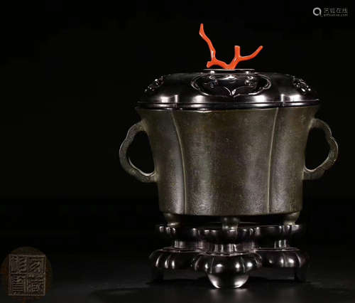 A BRONZE CASTED DOUBLE EAR TRIPOD CENSER