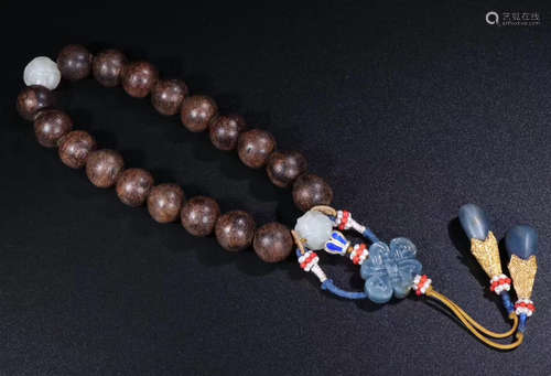 A CHENXIANG WOOD BEAD STRING BRACELETQ