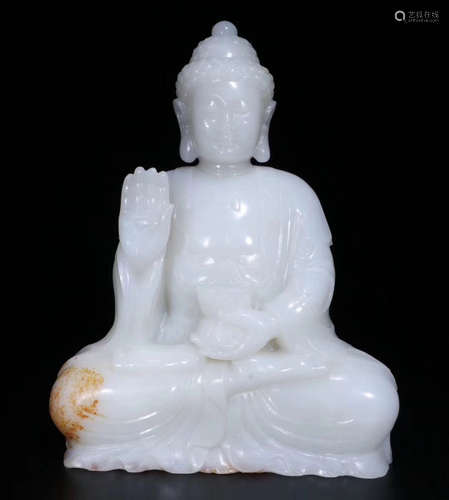 A HETIAN WHITE JADE CARVED RULAI BUDDHA