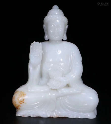 A HETIAN WHITE JADE CARVED RULAI BUDDHA
