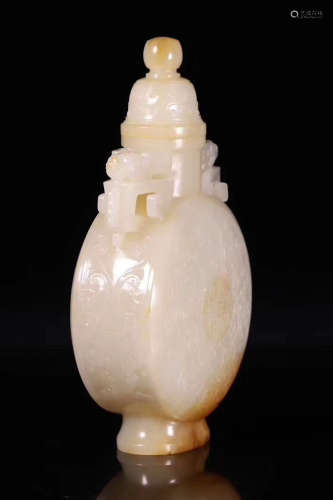 A WHITE JADE CARVED WRAPPED DRAGON PATTERN VASE