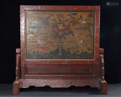 A LACQUER CARVED DRAGON PATTERN SCREEN