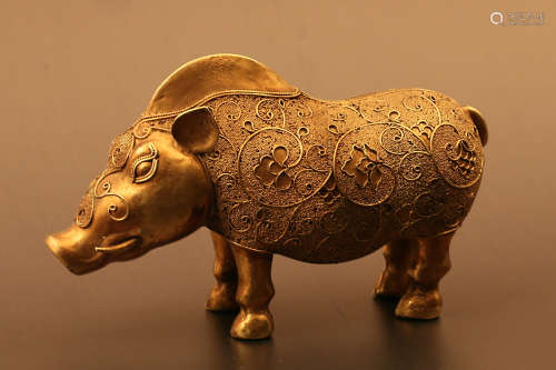 7-9TH CENTURY, A CARVED GILT BRONZE RHINOCERO STATUE, TANG DYNASTY