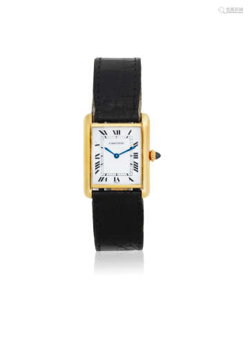 Tank, Circa 1990  Cartier. A lady's 18K gold manual wind rectangular wristwatch