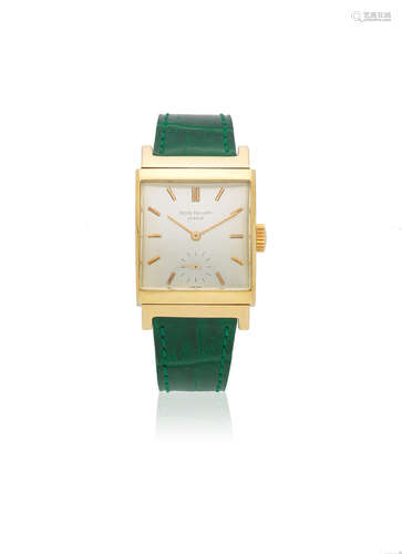 Ref: 2517, Circa 1950  Patek Philippe. An 18K gold manual wind curved rectangular wristwatch