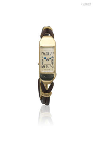 Duoplan, Ref: 23612, Circa 1940  Cartier. A lady's 18K gold manual wind back winding rectangular wristwatch