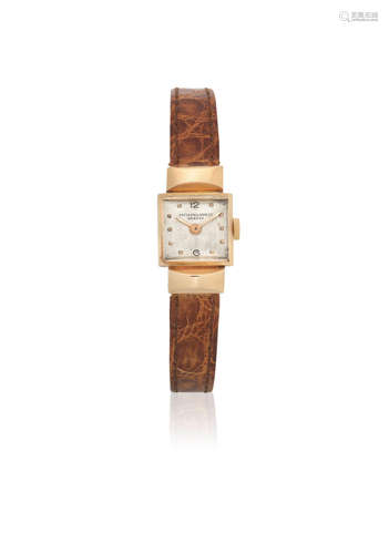 Ref: 2052, Sold 23rd October 1947  Patek Philippe. A lady's 18K rose gold manual wind square wristwatch