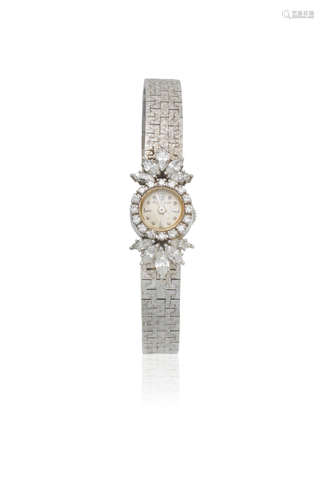 Circa 1953  Jaeger-LeCoultre. A lady's 18K white gold and diamond set manual wind cocktail bracelet watch