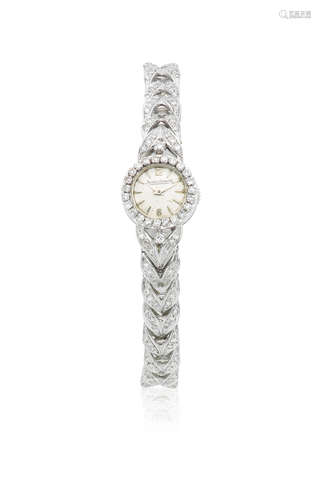 Circa 1959  Jaeger-LeCoultre. A lady's 18K white gold and diamond set cocktail bracelet watch