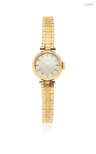 Circa 1955  Patek Philippe. A lady's 18K gold manual wind bracelet cocktail watch