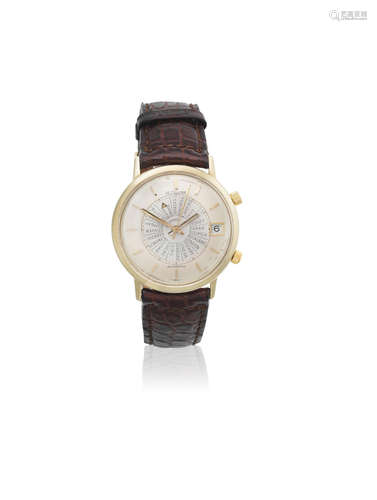 Memovox, Circa 1960  LeCoultre. A 14K gold automatic calendar alarm wristwatch with world cities