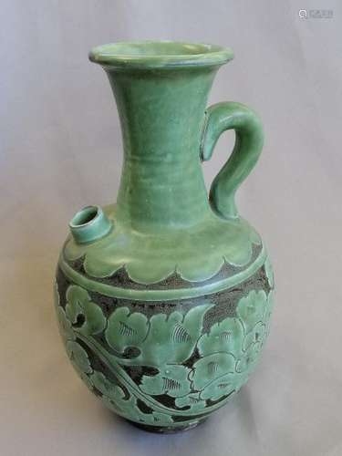 A CHINESE YUAN DYNASTY GREEN GLAZED EWER