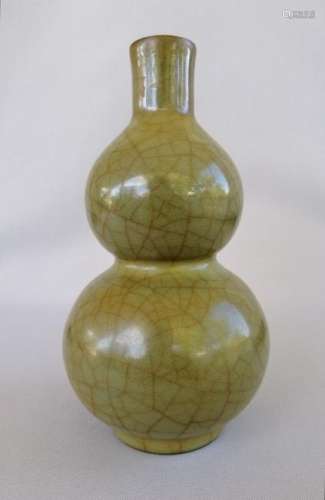 A CHINESE SONG DYNASTY GUAN KILN GOURD VASE