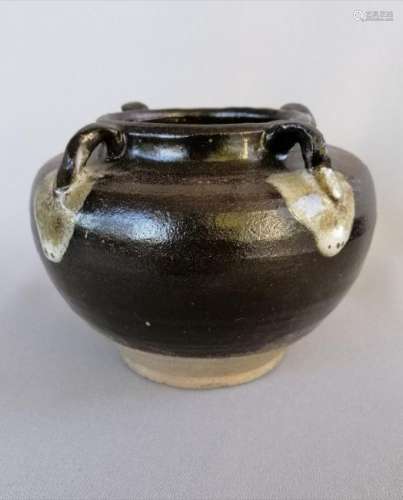 A CHINESE TANG DYNASTY BLACK GLAZED GUAN