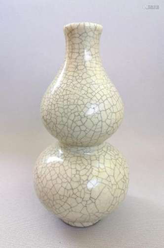 A CHINESE SONG DYNASTY GE GLAZE GOURD VASE