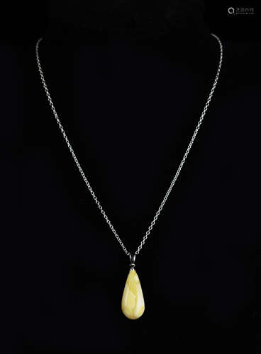 A Long Droplet Shaped Baltic Butterscotch/White Amber Pendant with 925 Silver Clasp and Chain