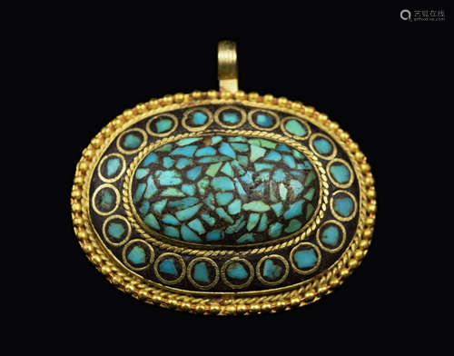 A Vintage Tibetan Turquoise on Brass Pendant