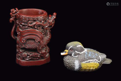 A Pixiu Paint Brush Holder and a Duck Ornament
