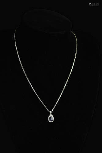 A 14K White Gold framed Sapphire Pendant with Diamond Splints and 925 Silver Necklace Chain