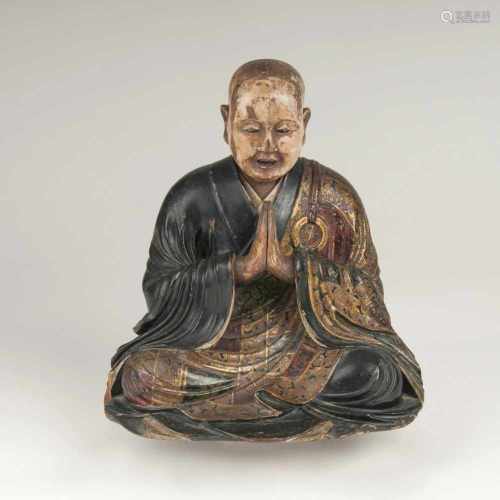 Figur 'Sitzender Rakan'Japan, späte Edo-Periode (1603-1868). Holz, polychrom gefasst, die Augen