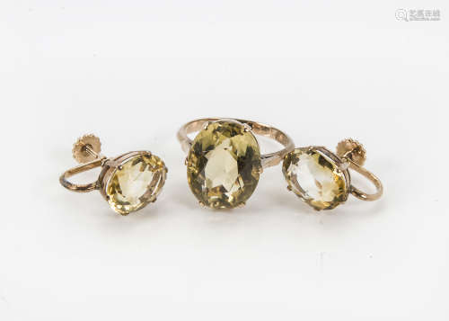 A 1960s gold and citrine dress ring, together with a pair of similar screw back earrings, 8.2g (3)