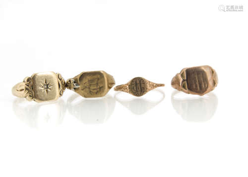 Four 9ct gold signet rings, one with gypsy paste stone setting, another with engraved shoulders, 17g