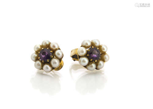 A pair of 9ct gold and seed pearl earrings, clusters centred with an amethyst and with clip backs,