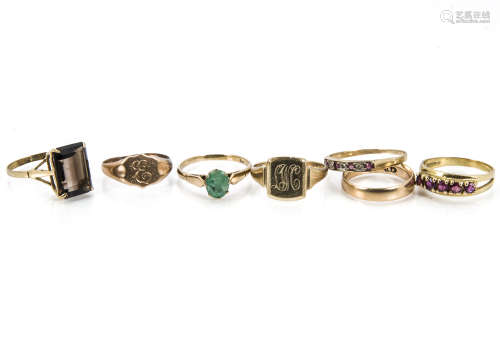 Seven 20th century gold rings, including a 14ct gold wedding band, two 9ct gold signet rings, and