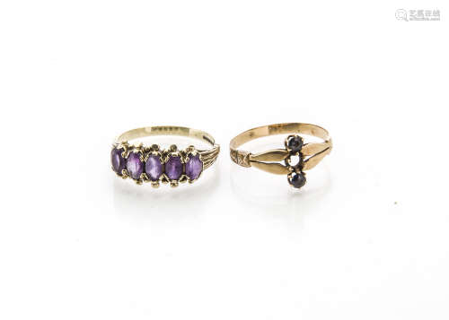 An amethyst five stone dress ring in 9ct gold setting, ring size N 1/2 and a continental sapphire