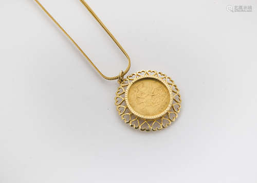 An Edward VII half sovereign pendant on chain, the 1904 half sovereign in heart shaped pendant on