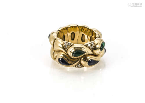 A modern 18ct gold and gem set expanding ring by Chopard, the hinged thick band set with tear drop