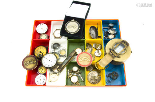 A collection of watches and spares and other items, including a WWII brass compass, along with