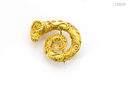 A continental yellow metal ram head and horn shaped brooch, with applied scroll decoration, 6.8g