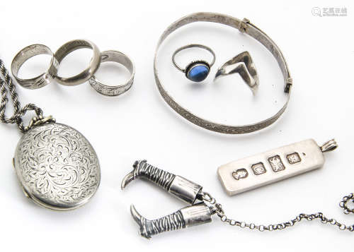 A collection of Victorian and later silver jewellery, including a pair of white metal riding boots