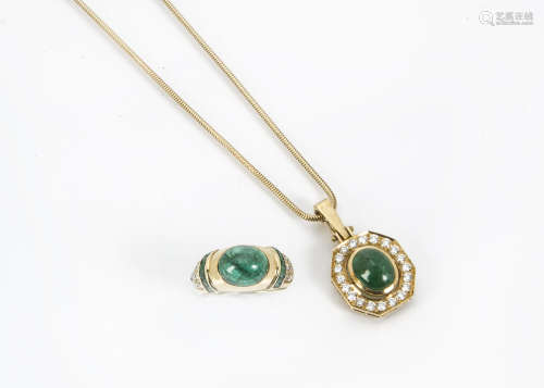 A modern 18ct gold emerald and diamond ring, with a central cabochon emerald with square cuts to the