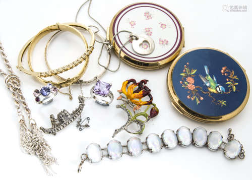 Two silver bangles, a collection of silver necklaces, various silver rings, two Stratton compacts,